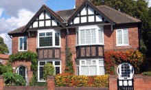 Two large semi-detached houses in the sun