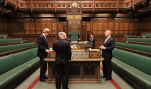 Four men in centre of house of commons