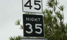 Speed limit sign with different speeds for day and night